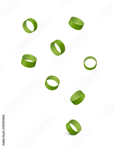 Chopped scallion leaf (green onion slices from different sides) hanging in the air. 
Isolated on white background. Realistic vector illustration.
