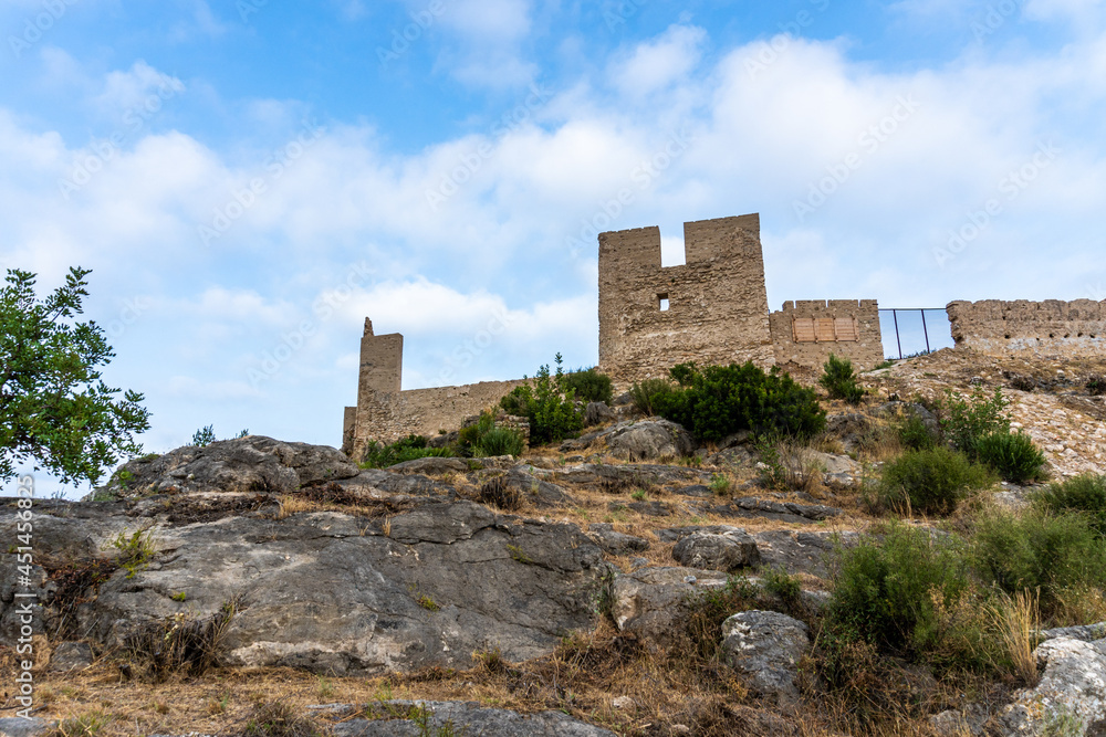 Ruins of Bairén's castle in Gandia (Valencia, Spain), in an afternoon with cloudy skies.