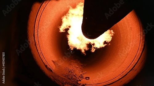 Flame in rotary kiln, cement plant, in slow motion during clinker production process HD.