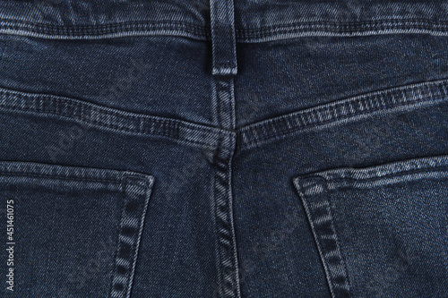 Close-up of dark blue jeans pockets. © lial88