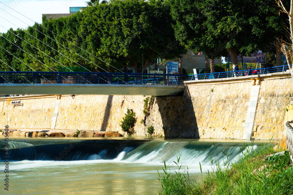Nice landscape of the Segura river as it passes through the riverbed in Murcia, with the silky-looking water