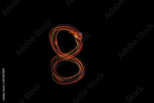 Number 8, long exposure photo of colorful lights, light painting. 