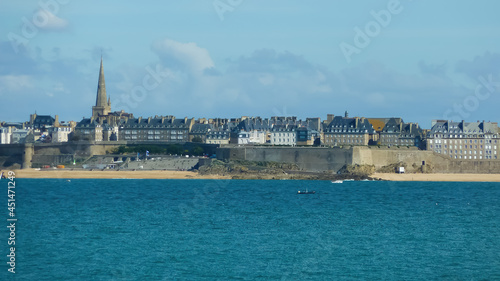 View over ocean bay from Dinard on citiyscape of breton town Saint Malo against dizzy sky