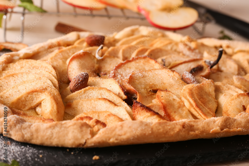 Appetizing pie close-up on a wooden background Appetizing pie close-up on a wooden background
