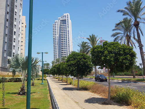 modern multi-storey houses with apartments for living in Netanya © Uri
