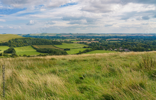 beautiful scenery overlooking the village of Oare from the South facing edge of the Marlborough Downs, adjacent to Pewsey Vale, Wiltshire AONB  photo