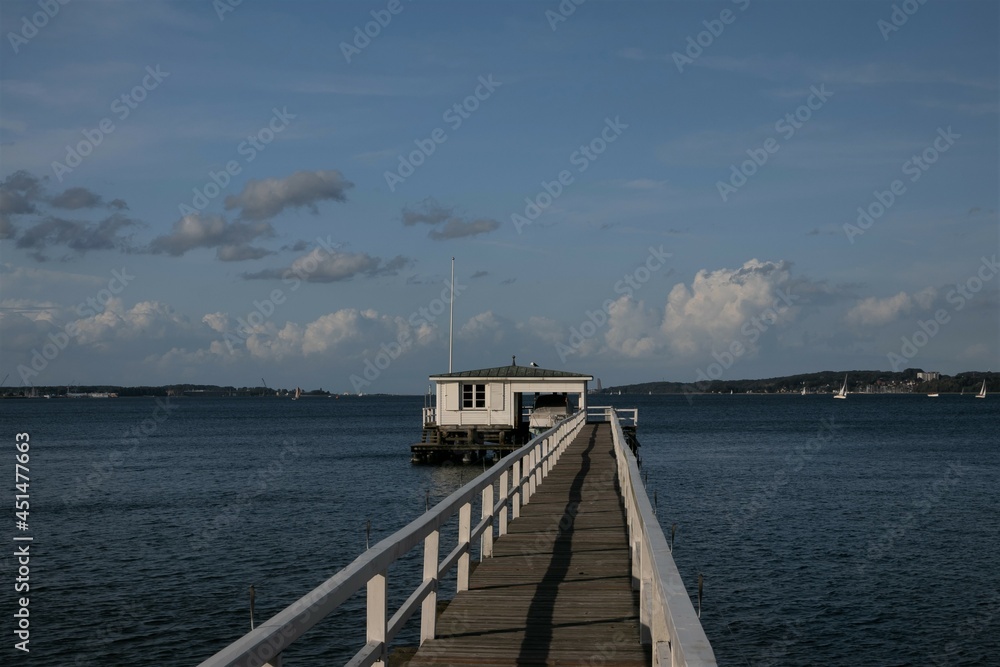 Beautiful view to a picturesque pier at the Kiel Fjord. Beautiful view to a picturesque pier at the Kiel Fjord.