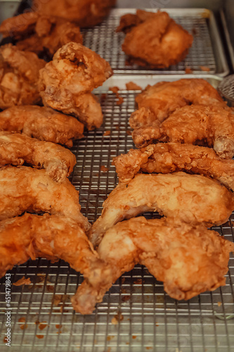 Southern fried chicken on a metal cooling rack