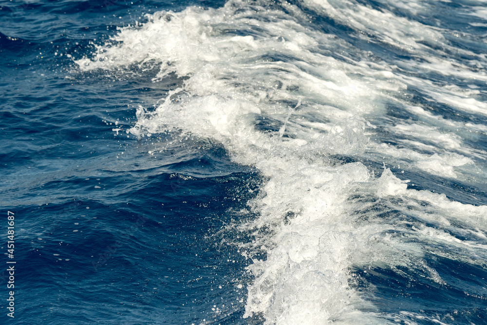 splashes and foam in the blue sea in Greece splashes and foam in the blue sea in Greece