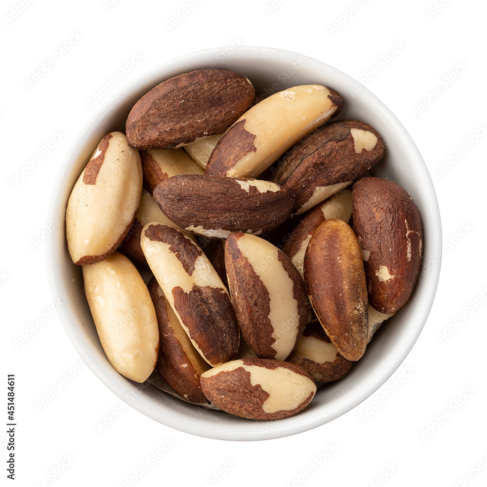 Brazil nuts in a bowl isolated over white background Brazil nuts in a bowl isolated over white background