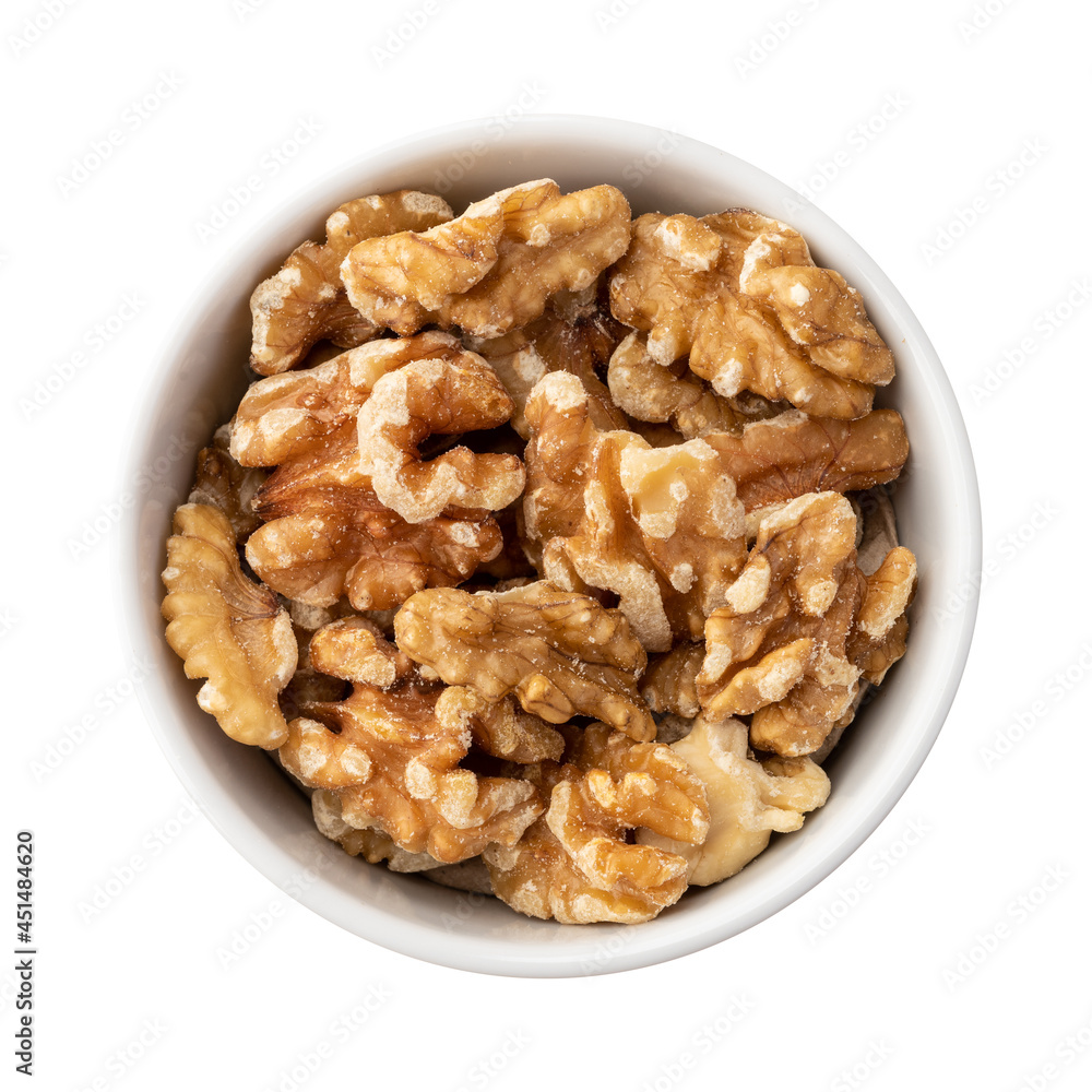 Walnuts in a bowl isolated over white background Walnuts in a bowl isolated over white background