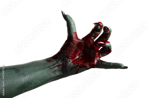 Hand of monster covered wit...