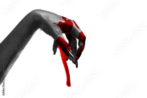 Hand of witch covered with ...