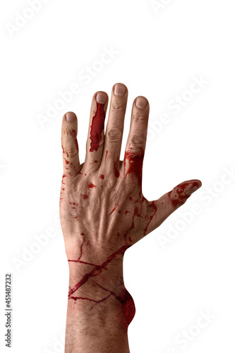 Human hand covered with blo...