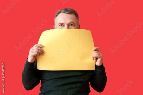 Mature man with blank poste...