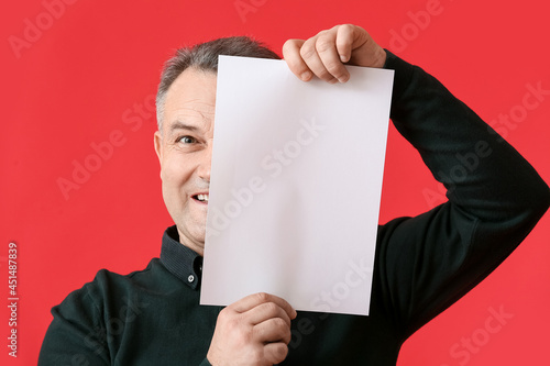 Mature man with blank poste...