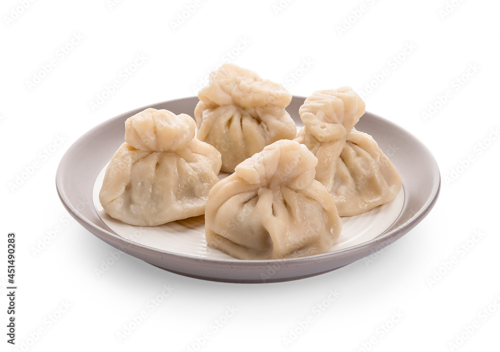 Plate with tasty dumplings on white background