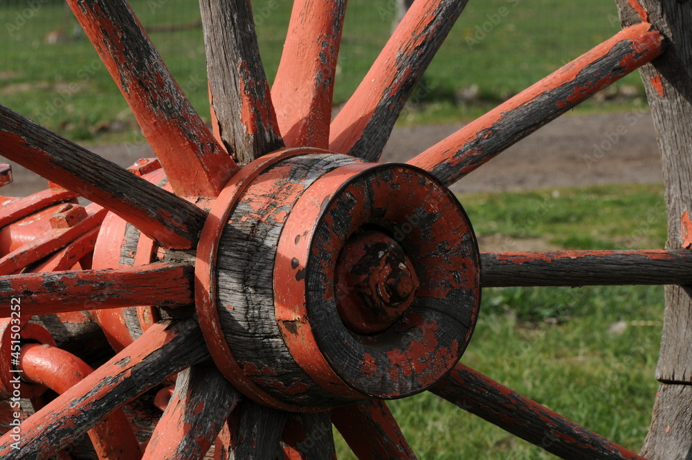 Details of an antique wooden wagon wheel Details of an antique wooden wagon wheel