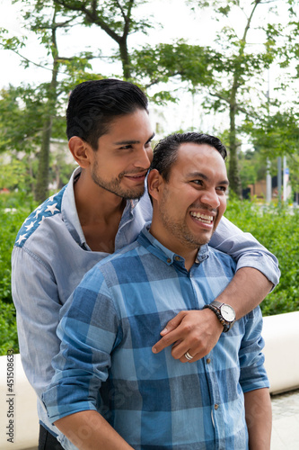 Latino gay men couple hugging in Jalisco Mexico, gay concept