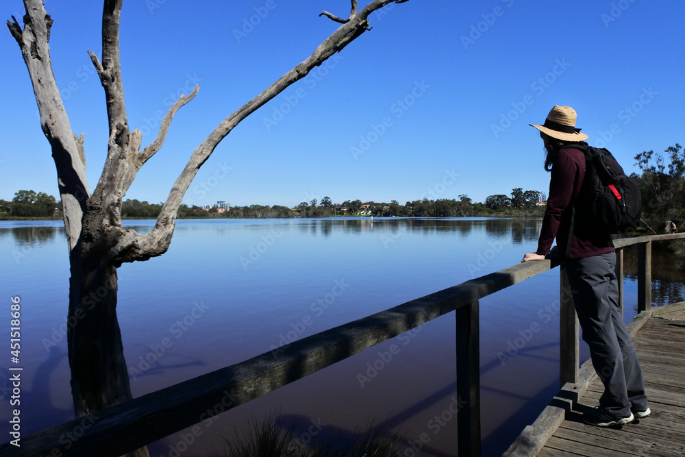 Australian woman looking at the Swan river Perth Western Austral