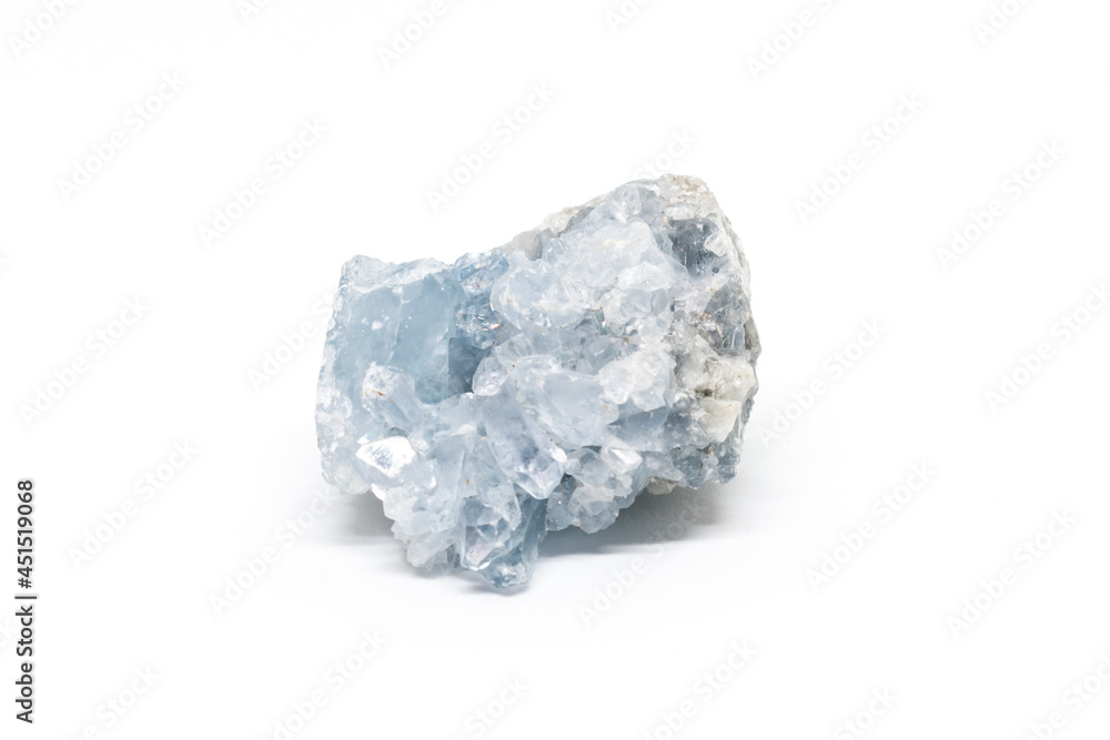 Rock of blue celestine mineral from Madagascar isolated on a pure white background