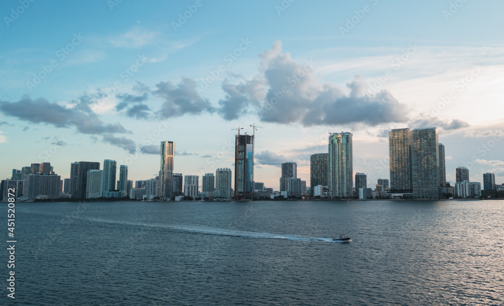 city skyline Miami Florida usa panorama boat sea buildings downtown sky clouds usa 