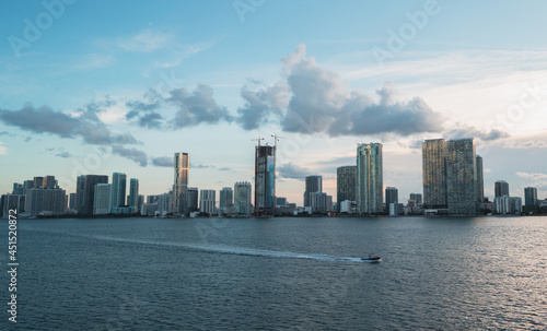 city skyline Miami Florida usa panorama boat sea buildings downtown sky clouds usa 