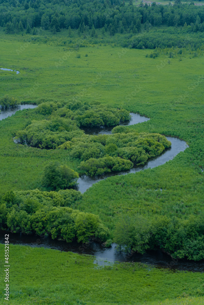 The wetland landscape in Hulun Buir, Inner Mongolia, China, summer time. The wetland landscape in Hulun Buir, Inner Mongolia, China, summer time.