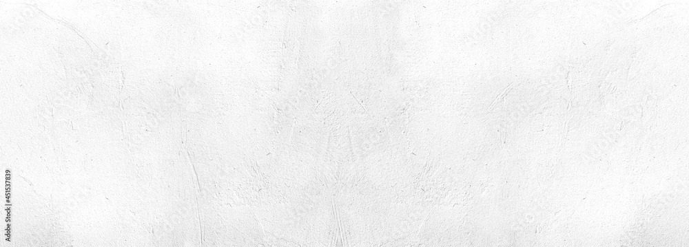 Surface texture of white concrete wall, cement pattern with cracks background with space to copy, panoramic view
