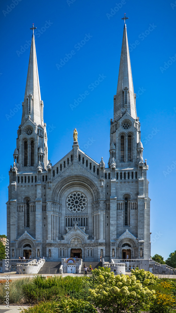 Exterior view on a summer day of the Basilica of Sainte Anne de Beaupre, in Quebec province (Canada)