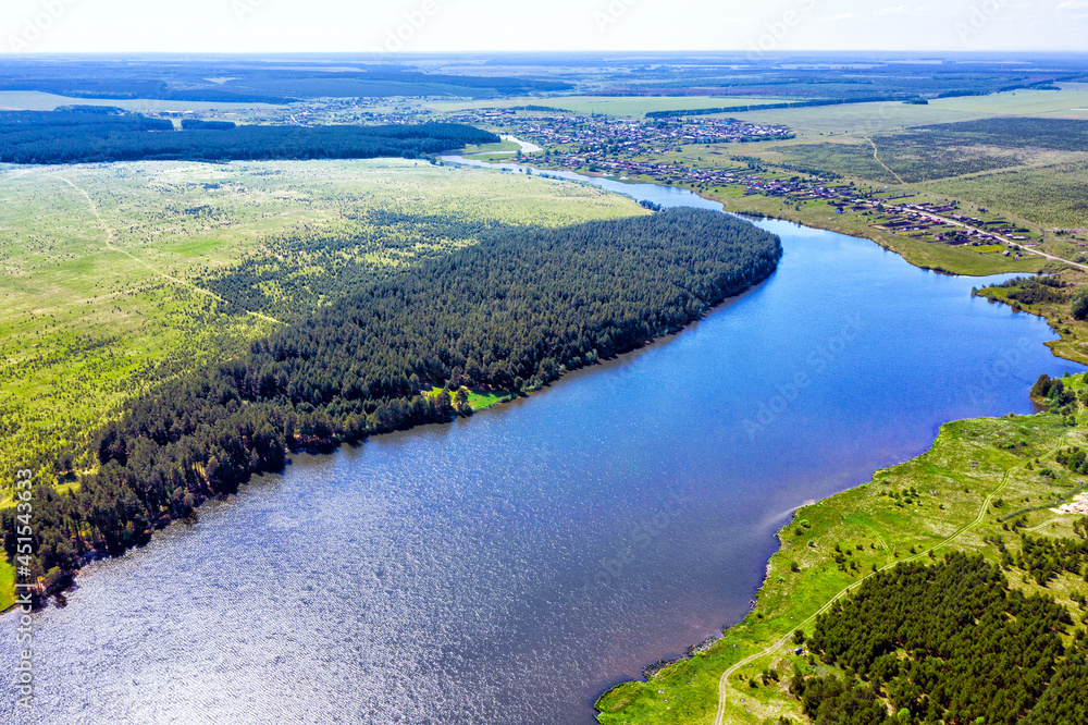 Aerial view of the river and forest on a summer sunny day Aerial view of the river and forest on a summer sunny day