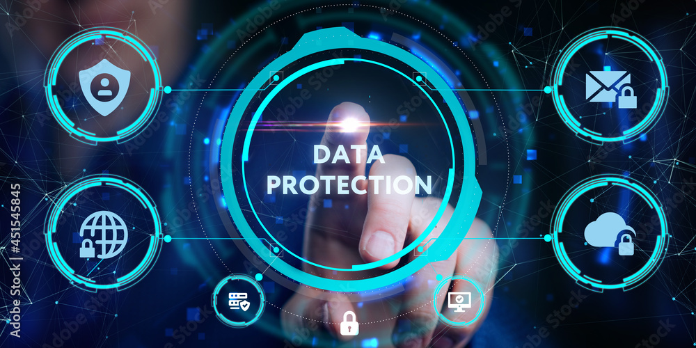 Fototapeta premium Cyber security data protection business technology privacy concept. Young businessman select the icon Data protection on the virtual display.