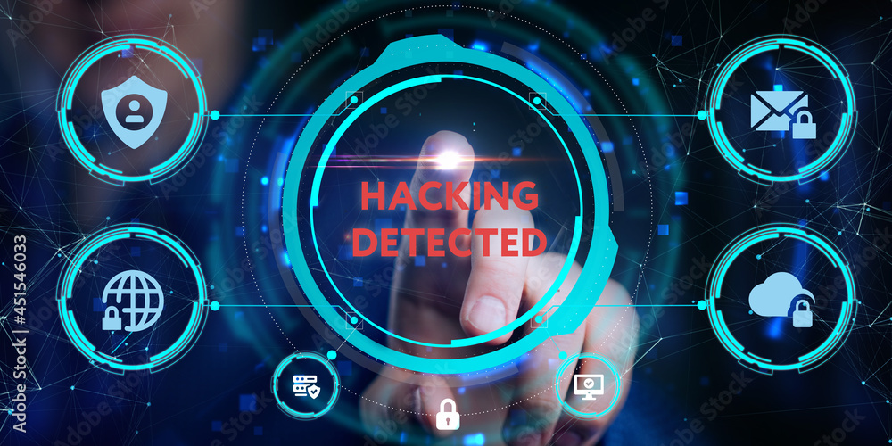 Obraz premium Cyber security data protection business technology privacy concept. Young businessman select the icon Hacking detected on the virtual display.