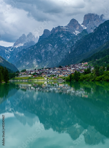 Dolomite mountains reflecting in the Mizurina lake  Italy