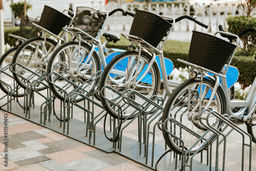 Row of city bikes parking for rent in Dubai
