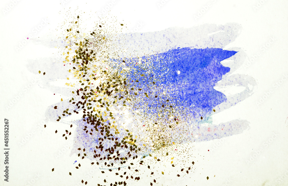 Golden glitter on abstract blue watercolor splashes in vintage nostalgic colors Golden glitter on abstract blue watercolor splashes in vintage nostalgic colors