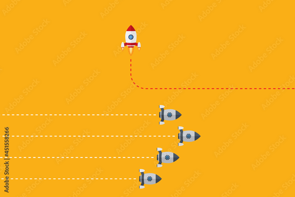 Think differently concept. Red rocket changing direction. New idea, change, trend, courage, creative solution, innovation and unique way concept. Think differently concept. Red rocket changing direction. New idea, change, trend, courage, creative solution, innovation and unique way concept.
