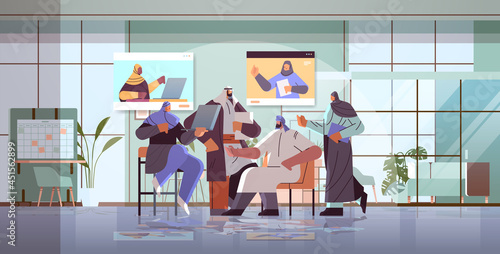 arab businesspeople team discussing with arabic colleagues during video call virtual conference