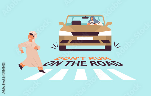 arab schoolboy running on crosswalk and driver stops car immediately don't run on road concept