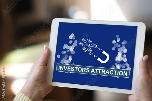 Investors attraction concept on a tablet