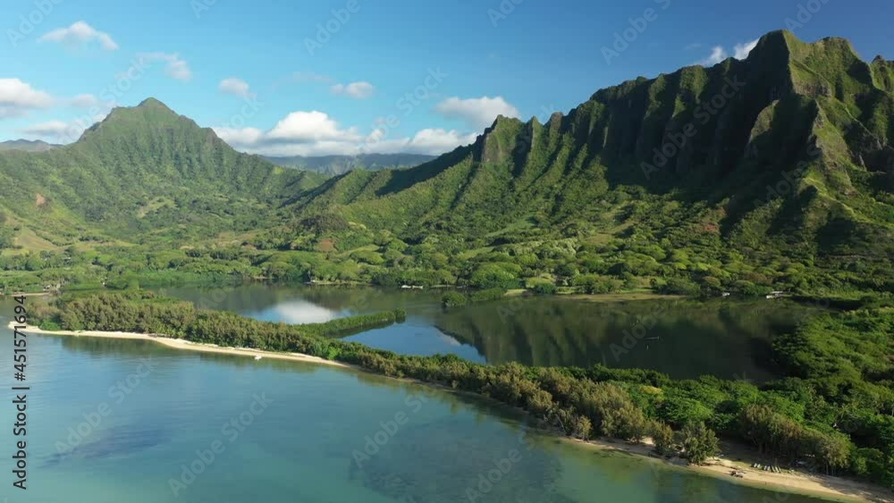 Aerial view of the ancient Moli'i fishponds with reflections of the Koolau mountains in the ponds. The ponds are located near Kaneohe, on the island of Oahu, Hawaii, USA. Aerial view of the ancient Moli'i fishponds with reflections of the Koolau mountains in the ponds. The ponds are located near Kaneohe, on the island of Oahu, Hawaii, USA.