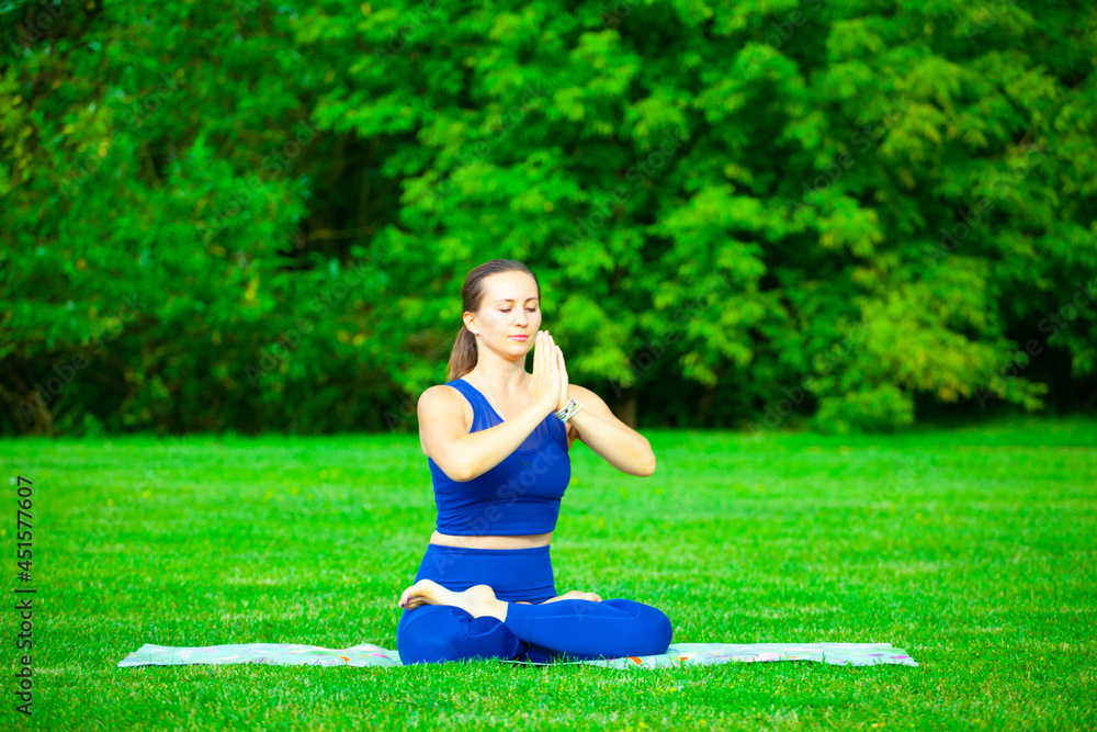 image of woman in a yoga park