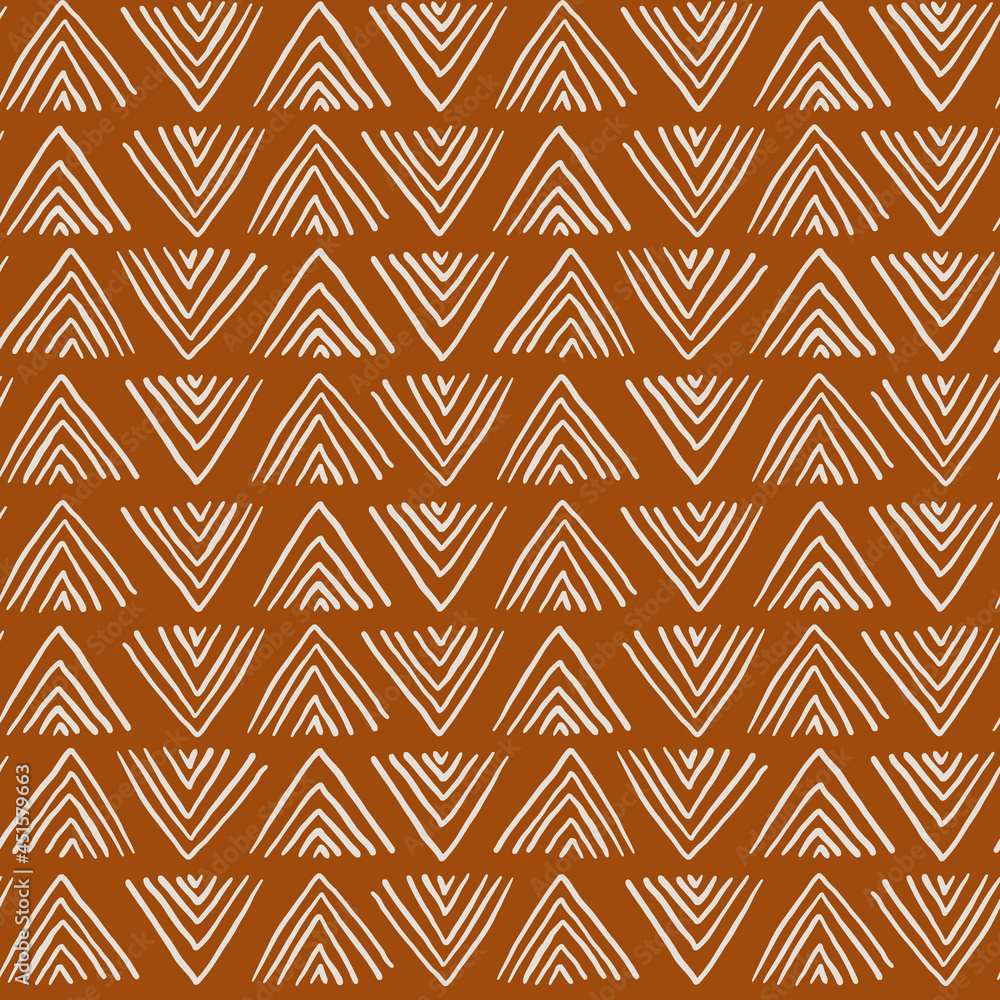 Ethnic brush stroke mud cloth fabric pattern. African boho seamless vector pattern in brown and beige, tribal.