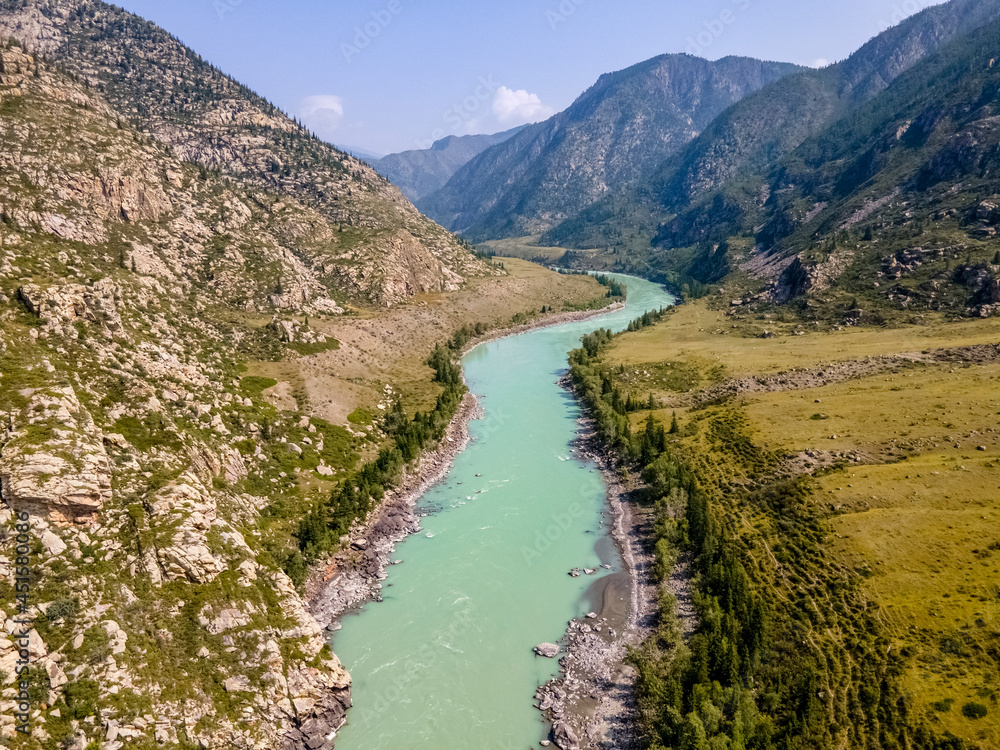 The Katun river with turquoise water. Beautiful landscape. Mountains and hills. Altai Mountains, Russia. Aerial view