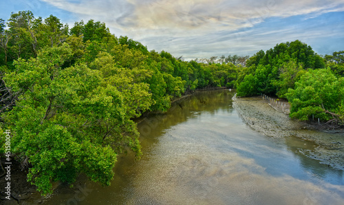 at the river in the evening The sun is setting on the horizon