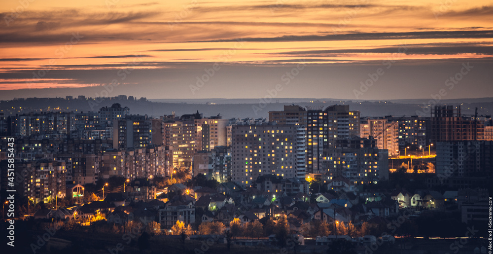 Fototapeta premium sunset over the city, ex ussr city