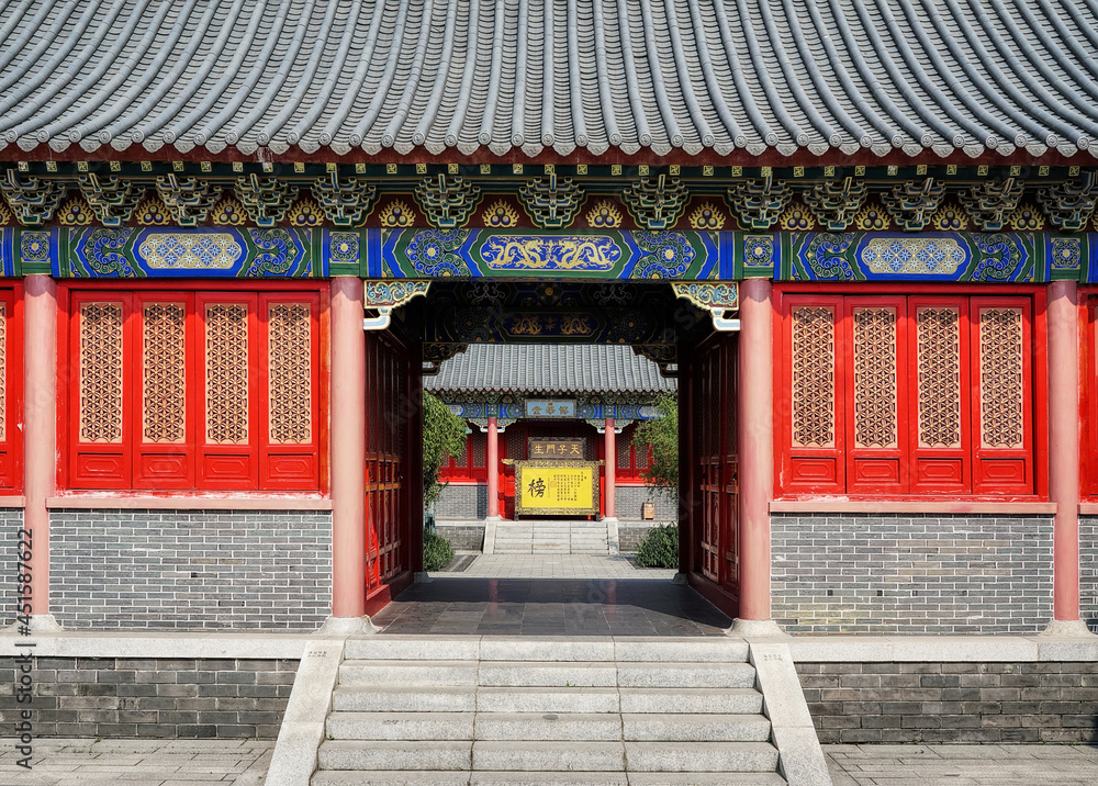 Foshan, Guangdong, China. Xi Qiao Mountain Guoyi Movie and TV City. Confucius garden. Wooden ornamented doors, the sample of  Lingnan architectural style. 