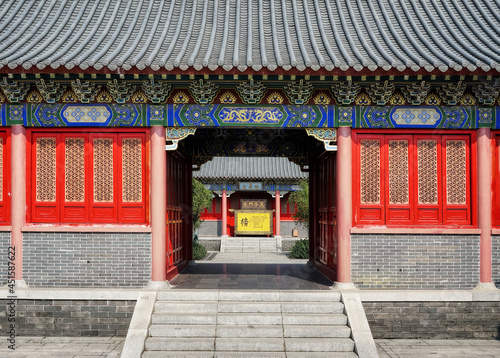 Foshan, Guangdong, China. Xi Qiao Mountain Guoyi Movie and TV City. Confucius garden. Wooden ornamented doors, the sample of Lingnan architectural style. 