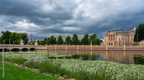 Burggraben mit der Schlossbrücke an der Lennestrasse und dem staatlichen Museum in Schwerin photo