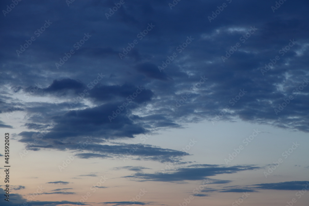 Beautiful evening clouds in the blue sky heaven landscape